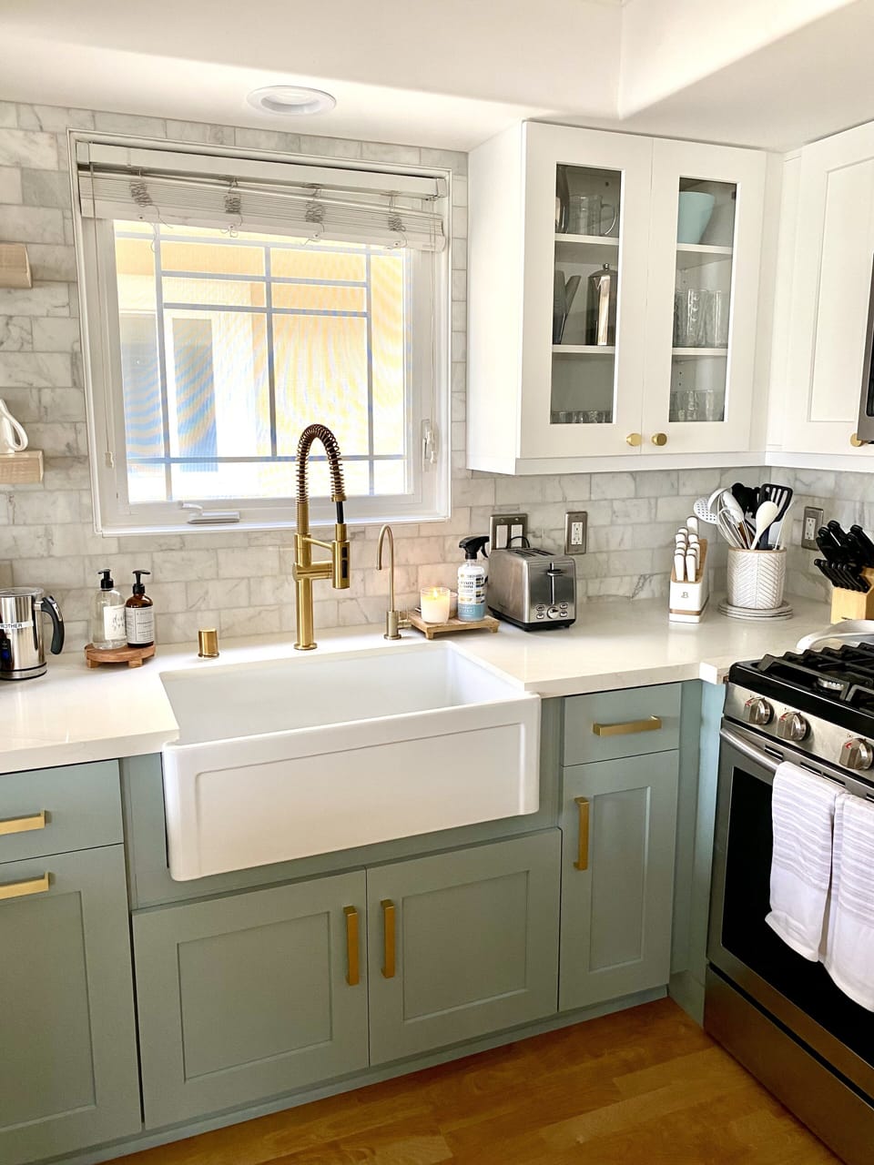 Farmhouse sink, new hardware and faucet.  Gas stove.  Fully stocked kitchen.