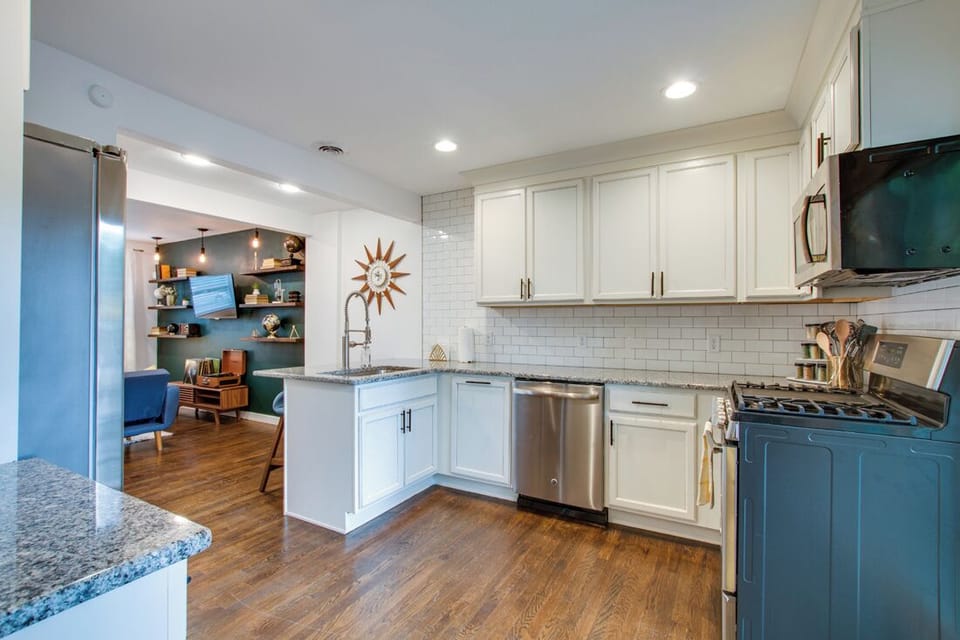 Full kitchen includes pots/pans, cooking utensils, dishware/glassware
