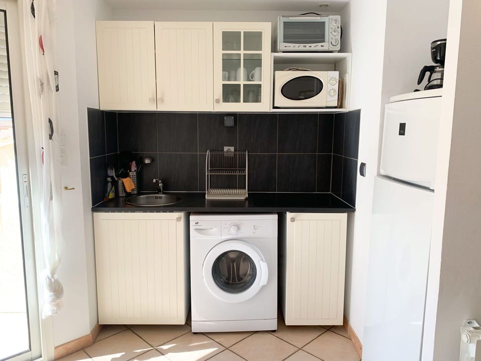 Laundry Room, Cabinetry, Property, Clothes Dryer, Washing Machine, Home Appliance, Kitchen Appliance, Kitchen Stove, Kitchen, Major Appliance
