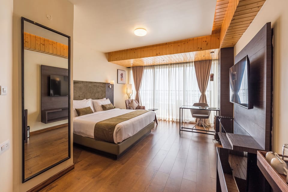 Premium Valley View with Balcony | Premium bedding, individually furnished, desk, soundproofing