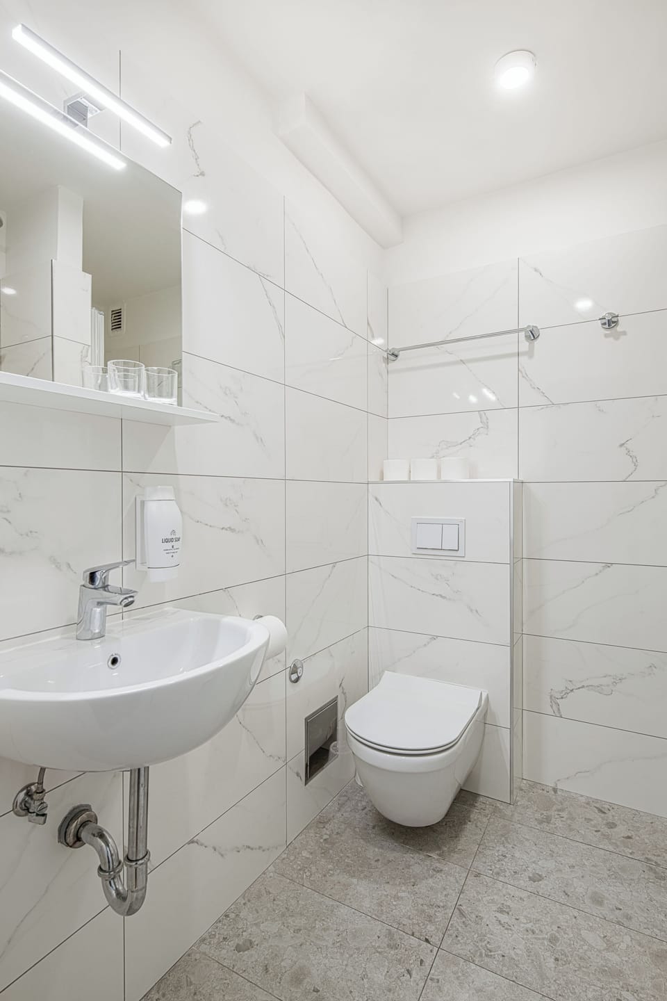 Standard twin room with extra bed | Bathroom | Shower, hair dryer, towels