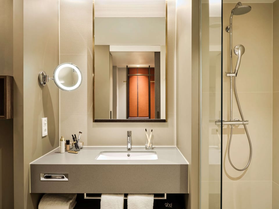 Hair dryer, towels, soap, shampoo