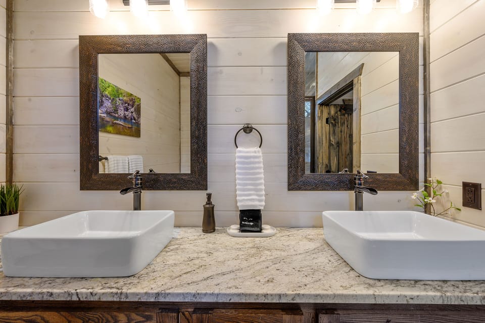 Double sinks in both en suite baths.