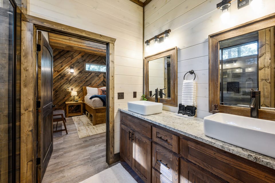 Luxury bathroom with towels, soap, TP provided.