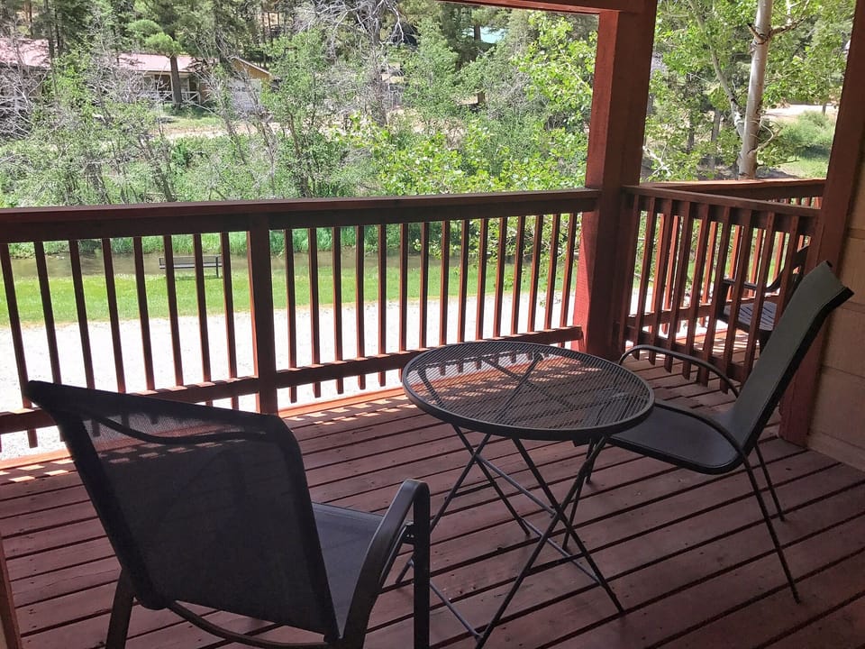 Sip your morning coffee here and breathe in the fresh mountain air as you take in peaceful views of the surrounding greenery and neighborhood.