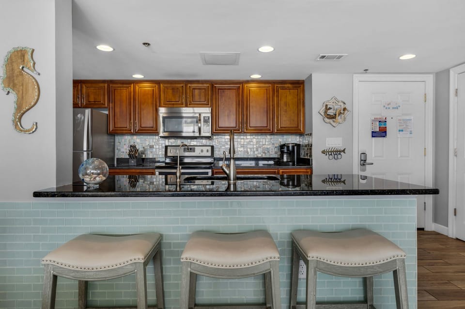 View of kitchen as seen from living room area