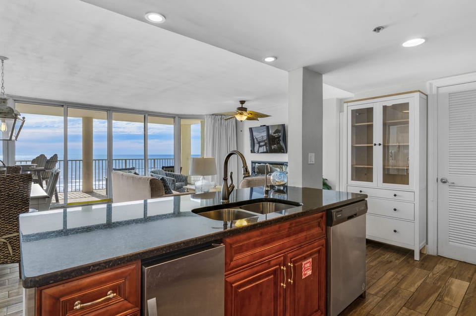 Icemaker and dishwasher in kitchen island area.