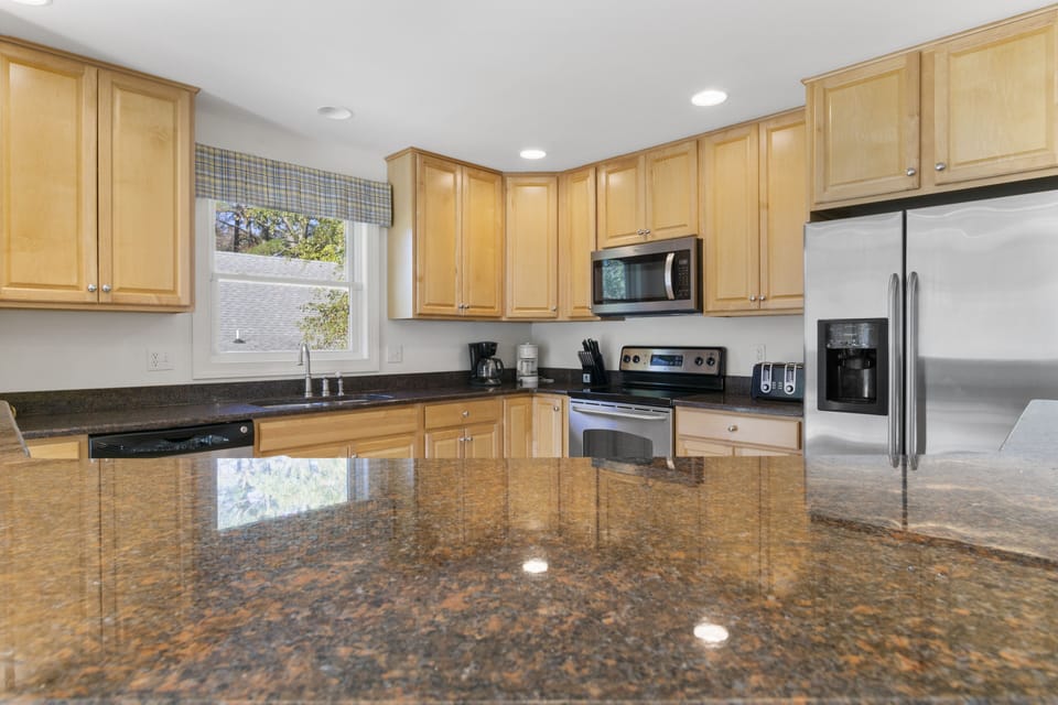 511 Doral Drive - Kitchen Interior - Detailed view of the kitchen’s generous counter space and storage, illustrating a layout that is as practical as it is stylish.