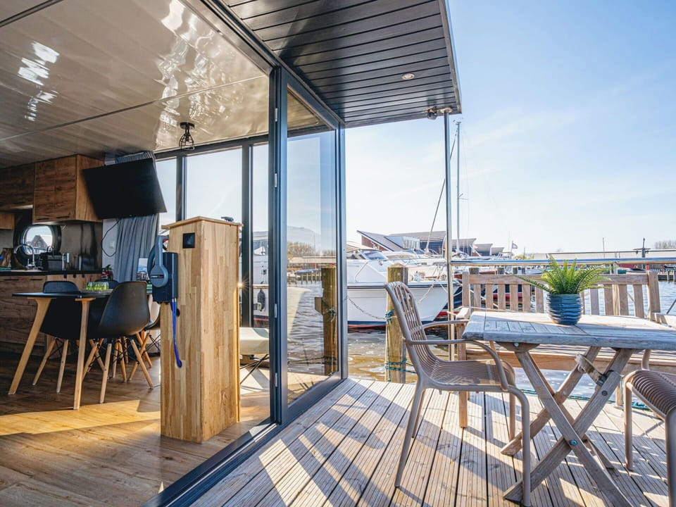 Deck, Wood Flooring, Hardwood, Deck, Plank, Chair, Wood Stain, Boat, Aluminium, Balcony