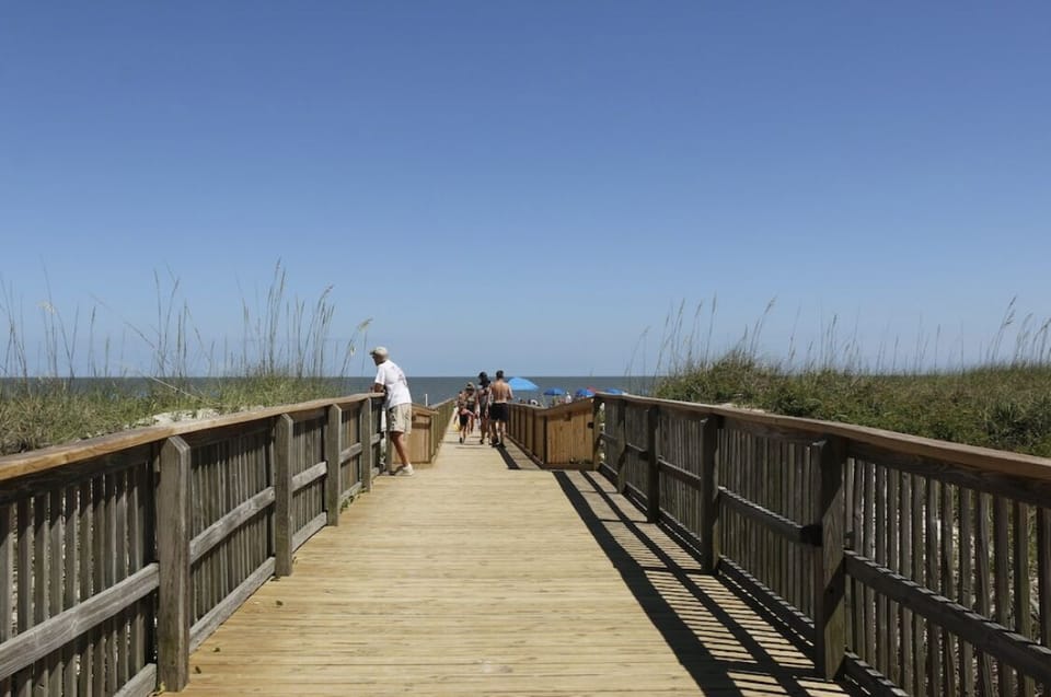 Boardwalk from the pool to the beach