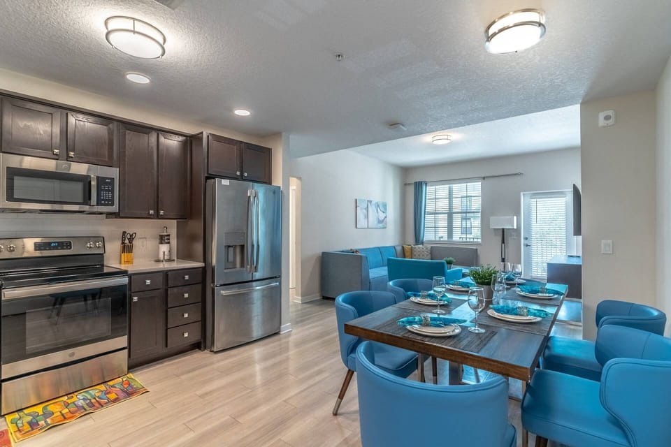 Open concept kitchen, dining and living room with plenty of natural light