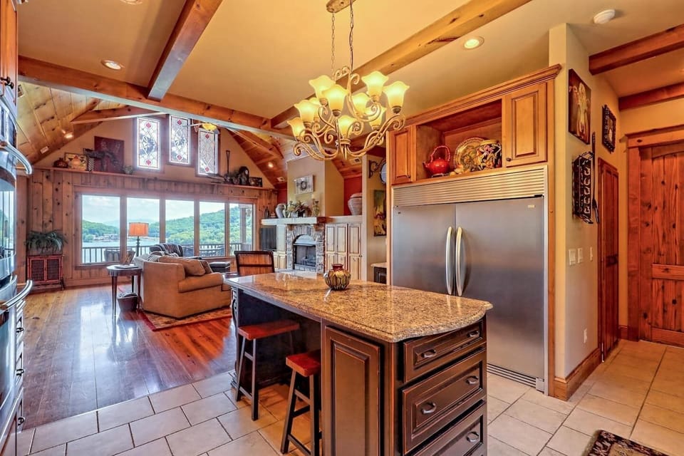 Large island with 2  long stools for that snack spot