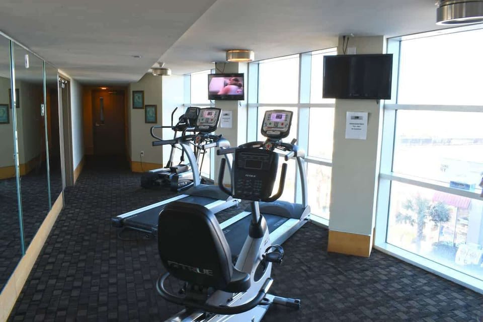- Fitness center with treadmills and ocean view windows   - Stay active while overlooking Myrtle Beach scenery below   - Ideal for keeping up with workouts during your coastal stay