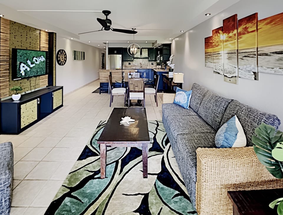 Comfortable and bright living room with flat screen TV.