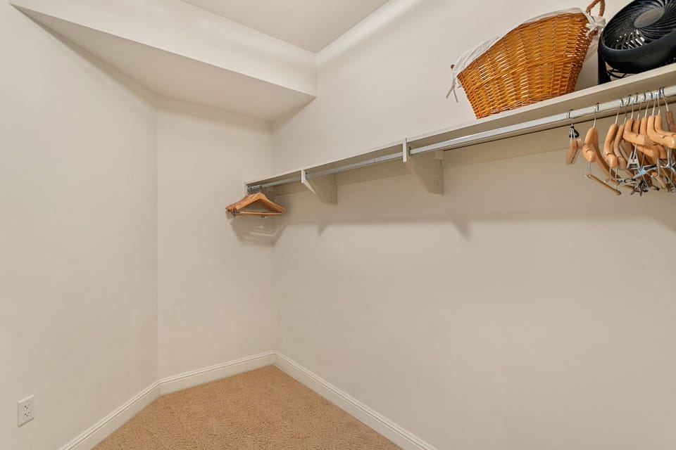 Guest bedroom with large walk in closet