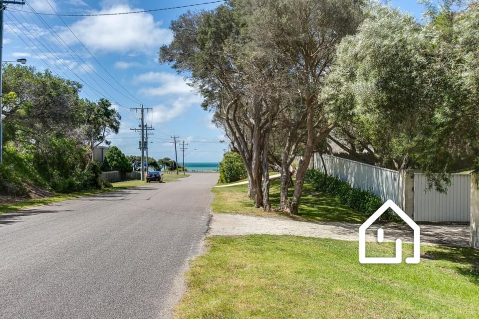 Private gated entrance, beach at the end of the street