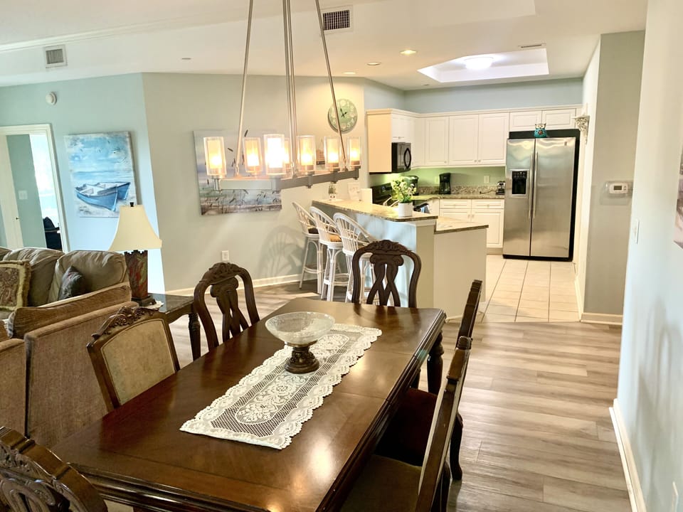 Large dining table with beautiful furniture!