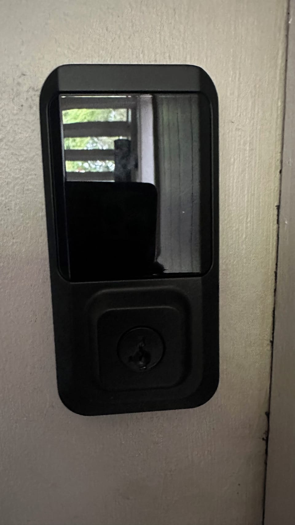 Touch lock to enter condo.