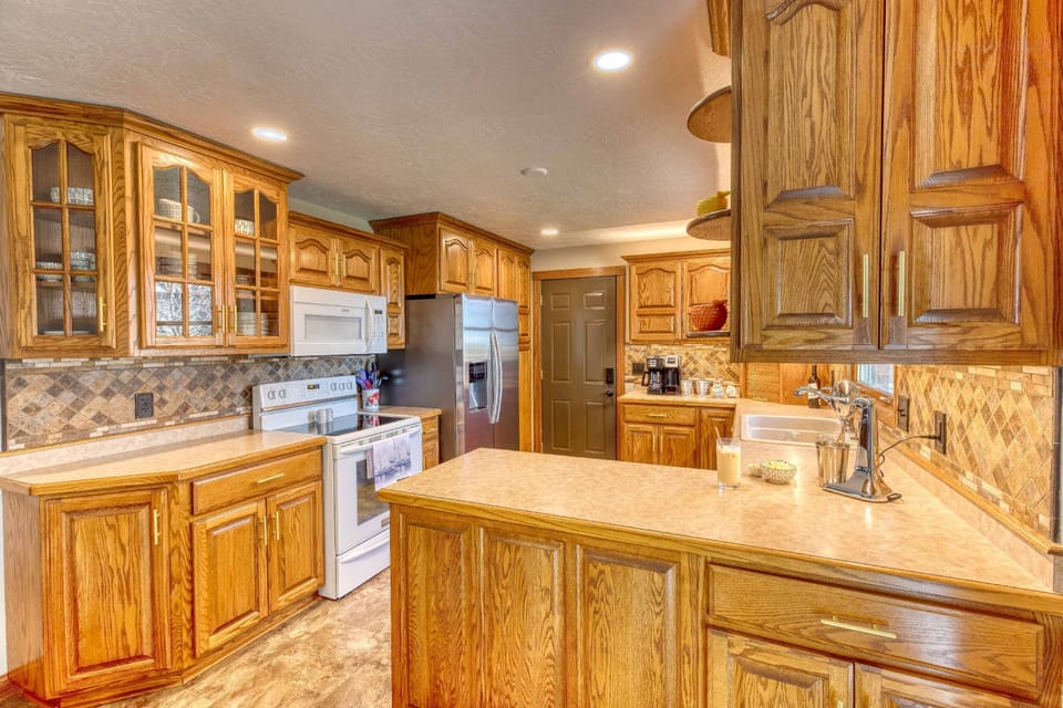 Kitchen/dining area open on the main floor and sliding door to the back patio.