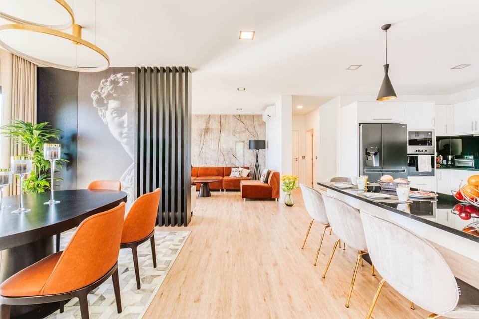 Open-space kitchen seamlessly connected to the living area, fully equipped for comfort and style—perfect for cooking, dining, and socializing in a modern luxury setting. #OpenSpaceLiving #ModernKitchen #VillaBelmonte