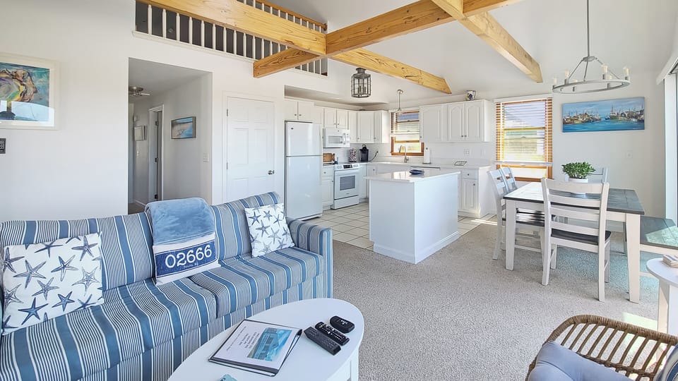 Open and bright main living area with vaulted ceiling