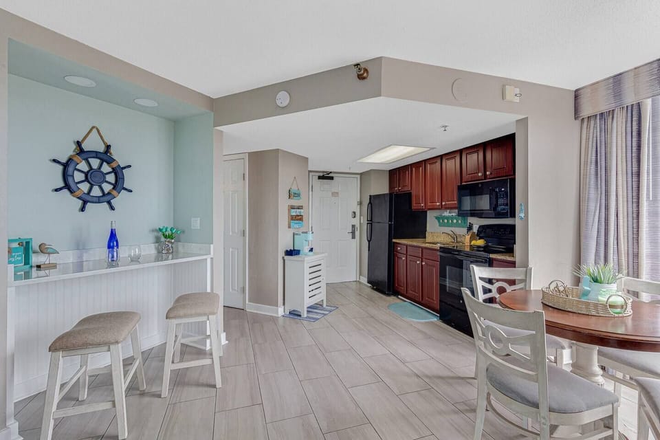 For those moments when you prefer staying in, the recently renovated full kitchen, complete with a granite countertop, comes fully stocked to empower you to prepare delicious homemade meals with ease.