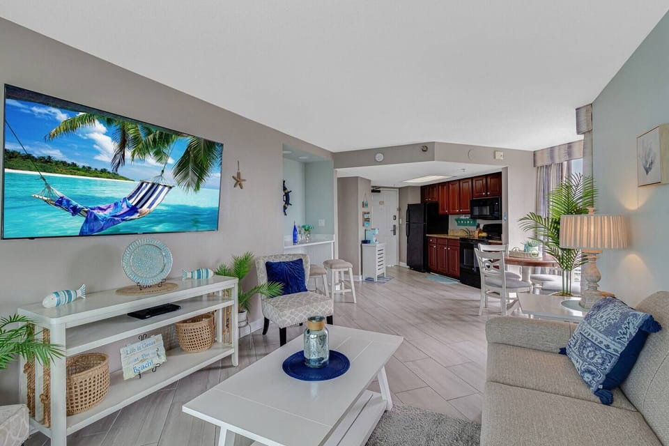 A spacious and sophisticated living area provides the perfect retreat for relaxation after a day's activities, a welcoming space for gathering with loved ones, and an environment for crafting enduring memories.