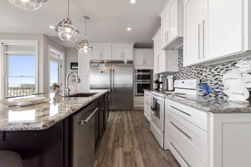 The well equipped kitchen has all high end appliances