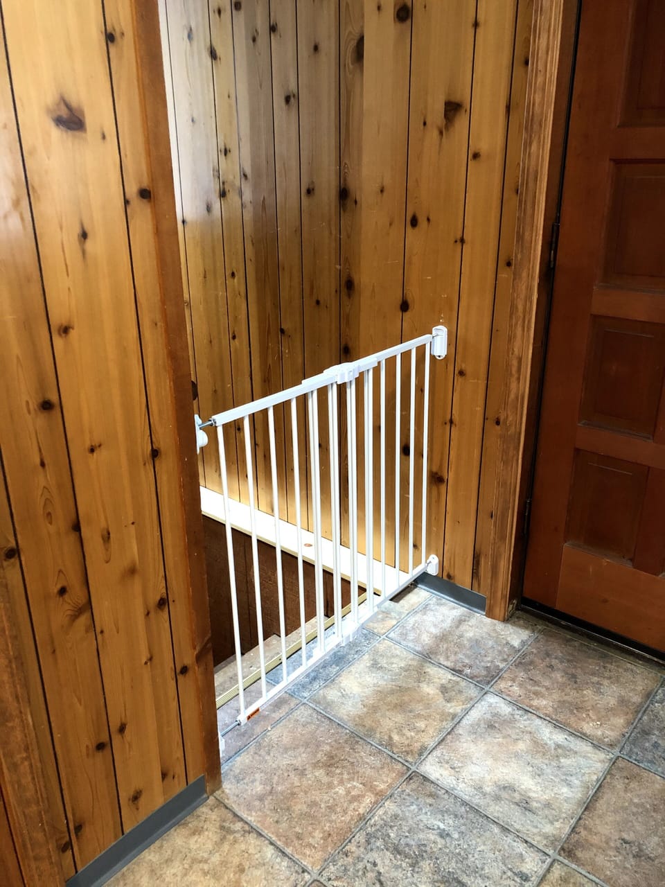 Childproof gate leading to the basement for added safety!