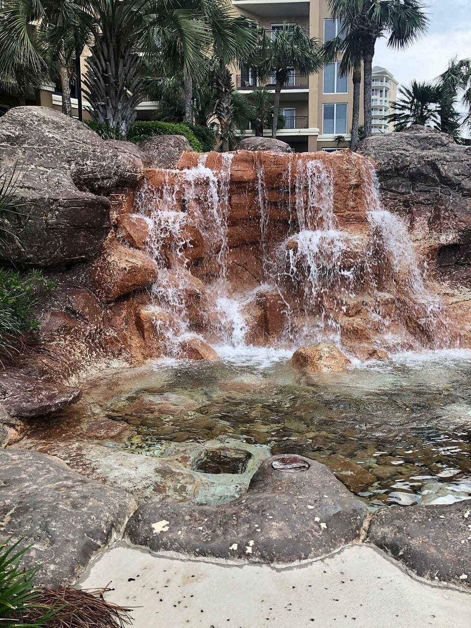 Beautiful waterfall beside the hot tub.
