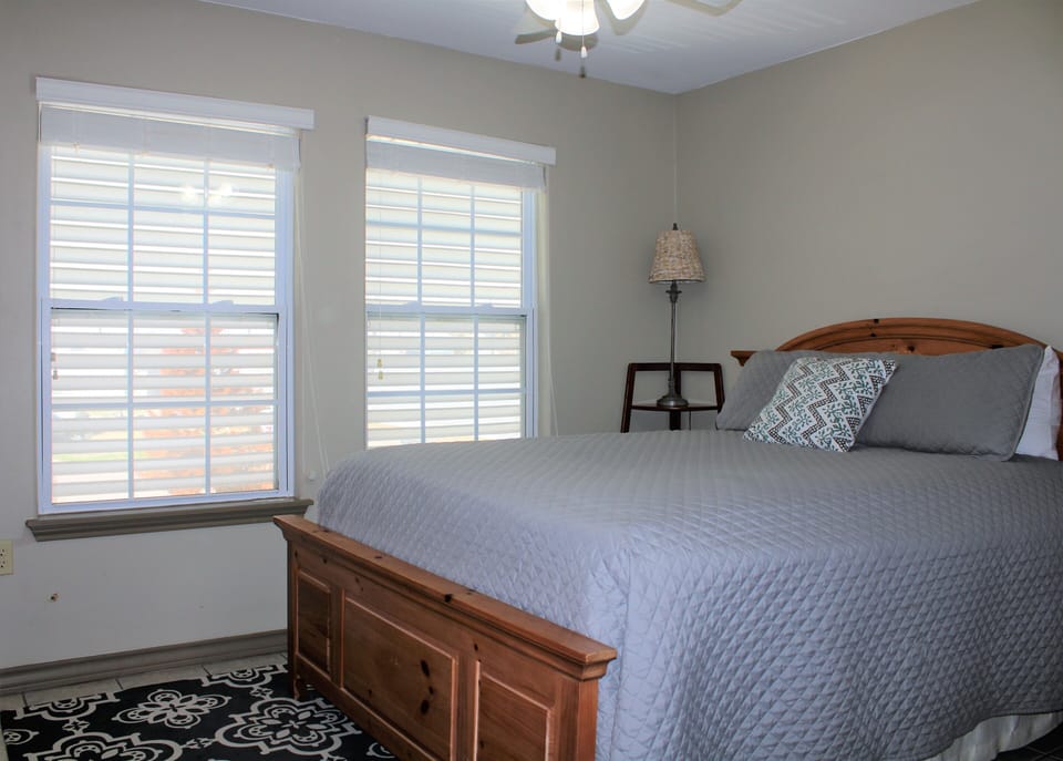 The master bedroom has a queen bed.