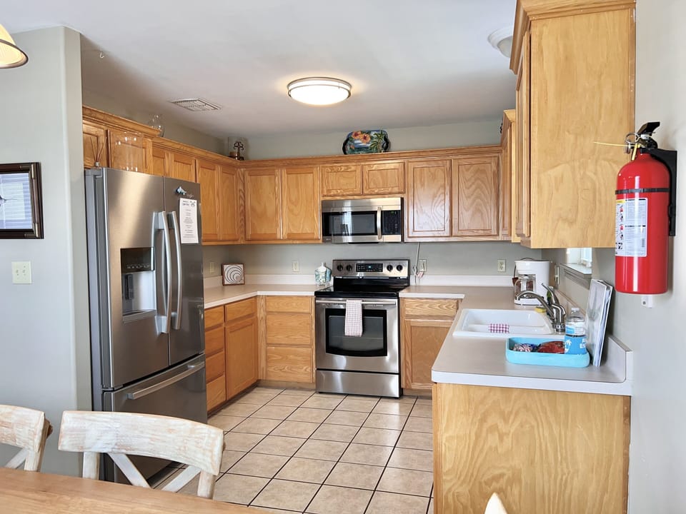 Great size kitchen for cooking all your meals with a side by side refrigerator
