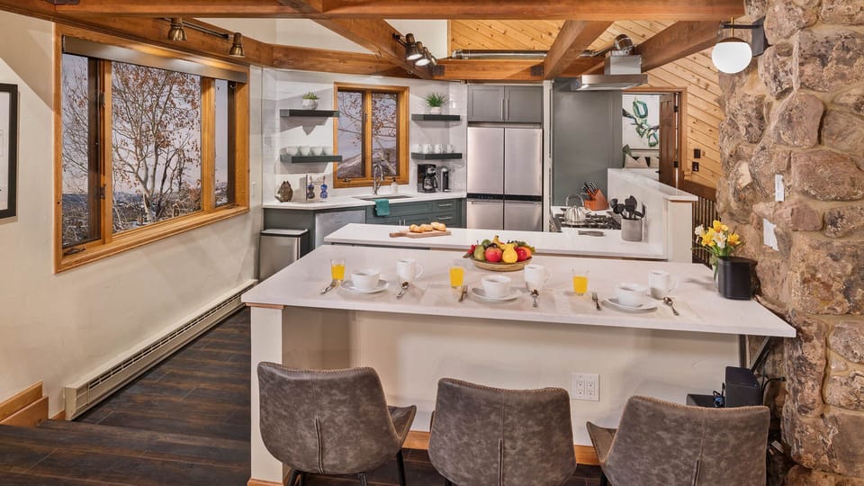 Kitchen, Main Level, Glacier Lodge West - Island with bar seating