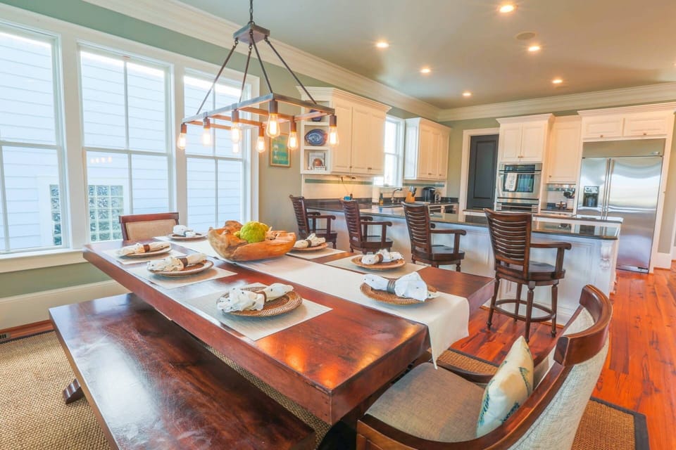 Gigi's Beach House has an open floor plan layout between the kitchen, dining room and living room.