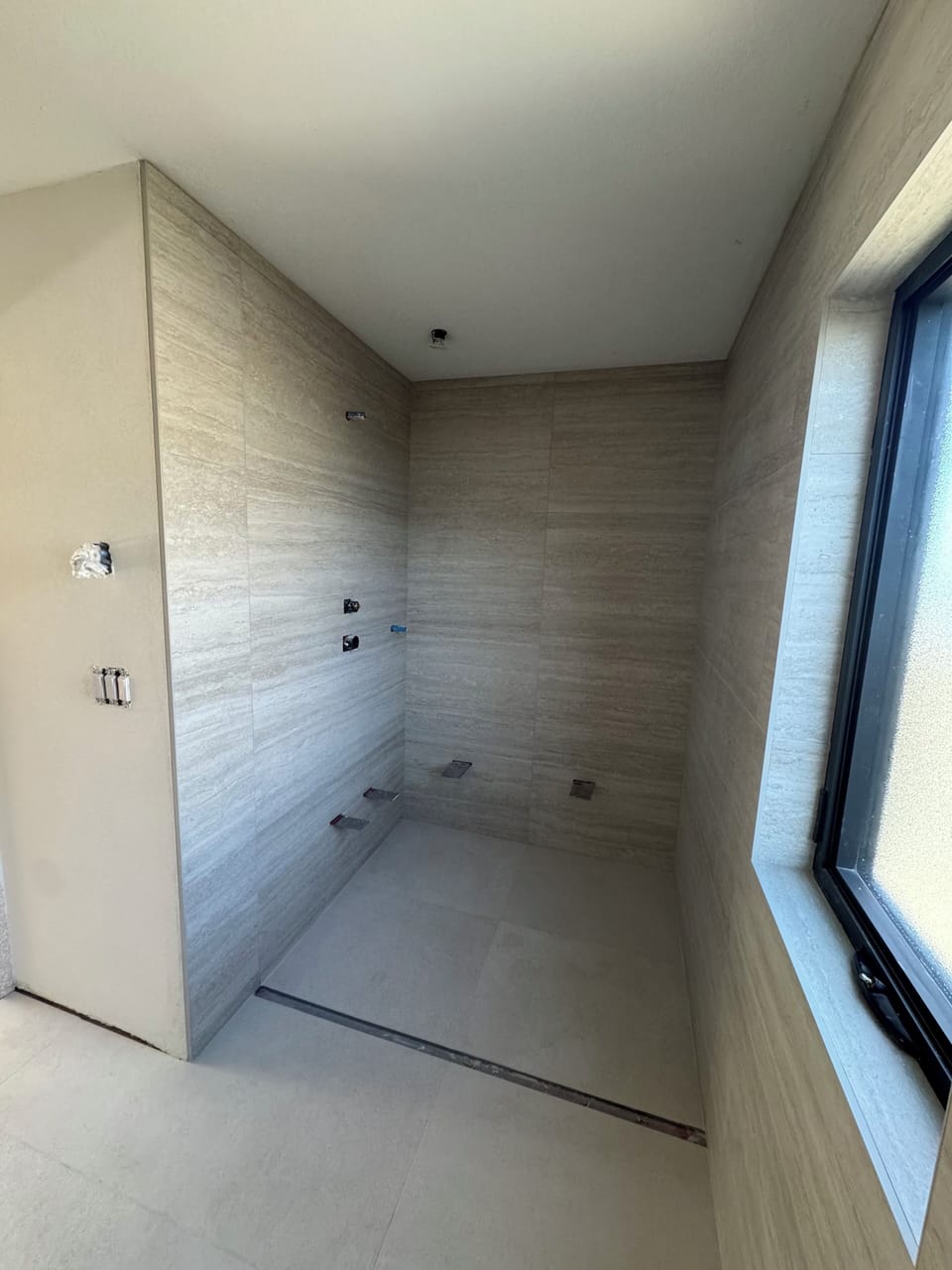 All new walk in showers plus an additional 3rd full bath added.