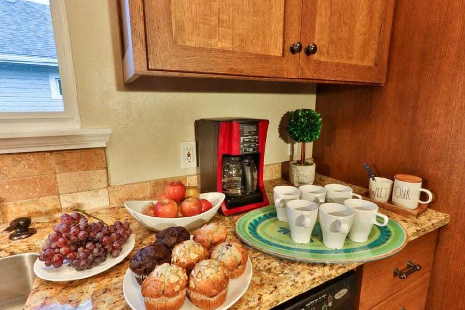Drip coffee pot with starter coffee beans and grinder