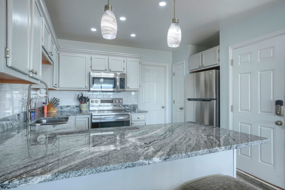Great dining penisula ! Plus: ice maker, crock pot, grilling tools