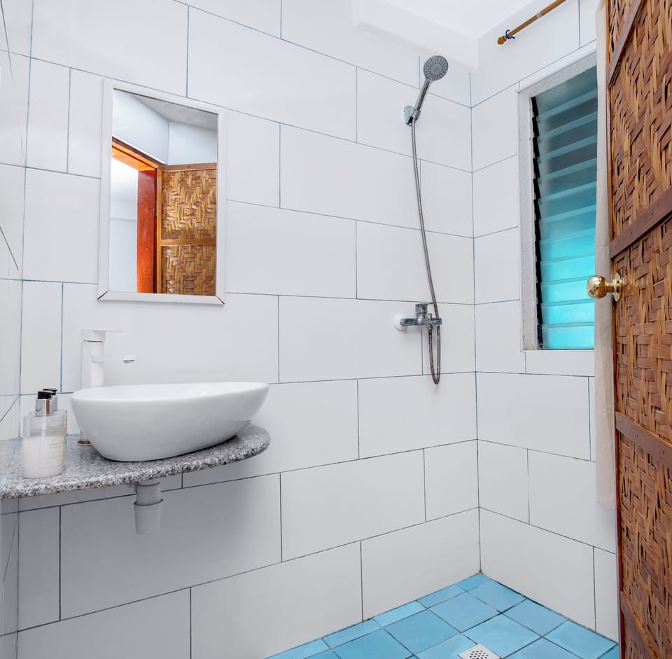 Double Room (with Air Conditioner) | Bathroom | Shower, towels