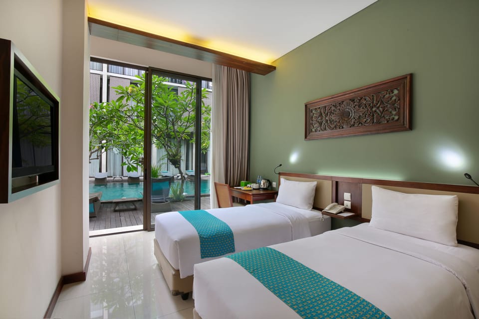 Deluxe Room, Pool Access | In-room safe, desk, rollaway beds, free WiFi