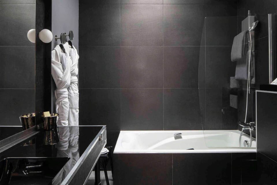 Shower, free toiletries, hair dryer, bathrobes