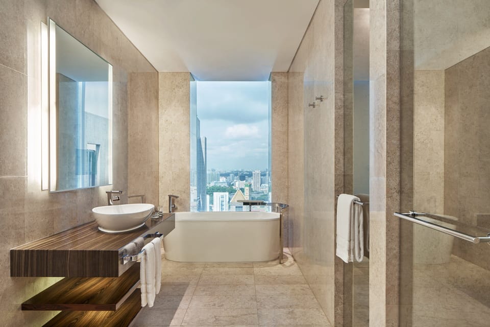 Junior Suite, 2 Double Beds | Bathroom | Separate tub and shower, rainfall showerhead, free toiletries