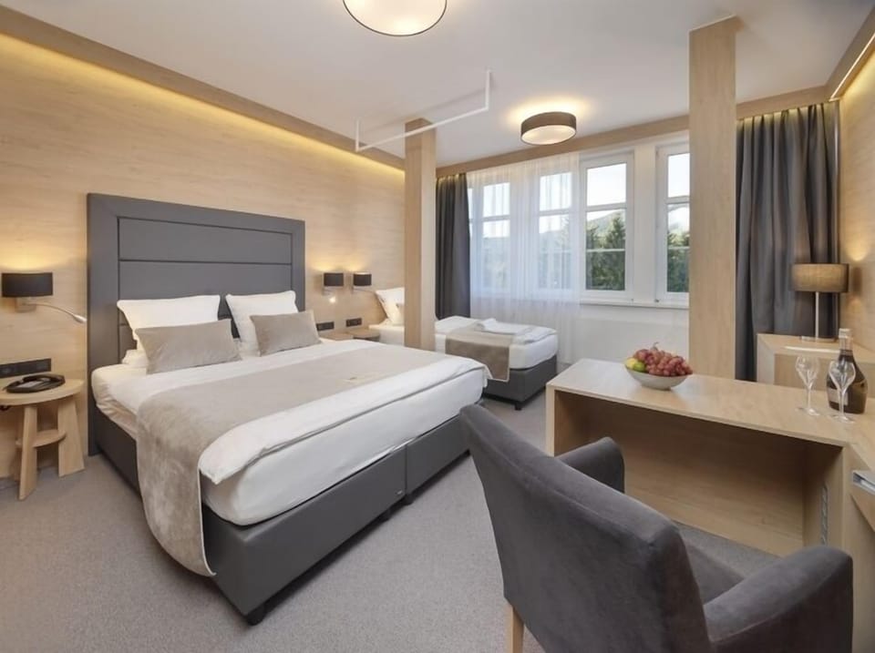 Superior Triple Room, Hill View | Minibar, in-room safe, desk, iron/ironing board