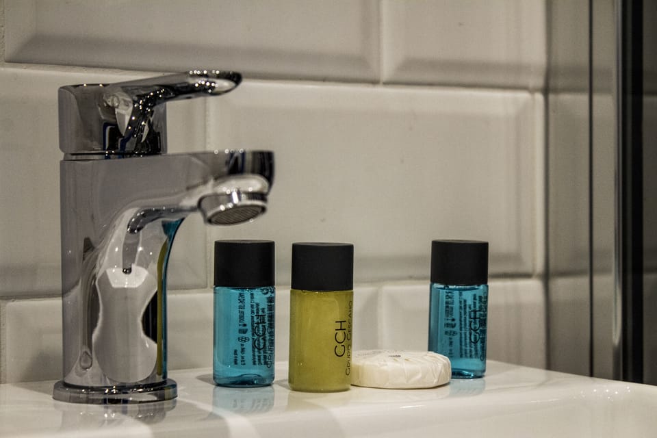 Standard Quadruple Room | Bathroom | Shower, hair dryer, towels, soap