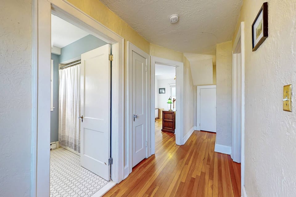 There are 3 bedrooms and two full baths upstairs