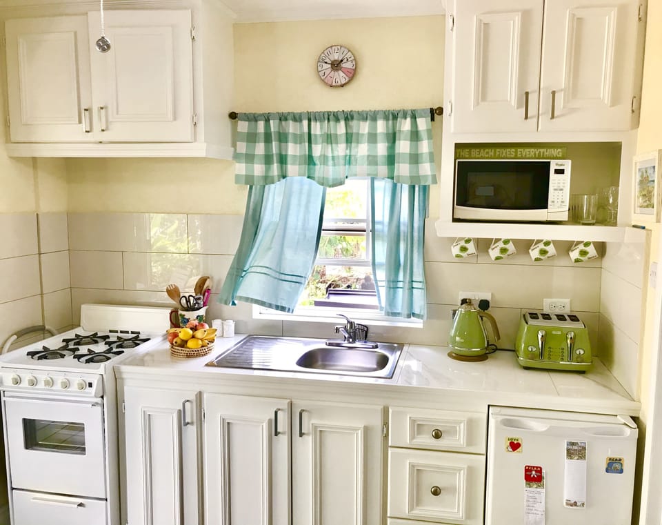 Our fresh, breezy and sparkling clean little kitchen 