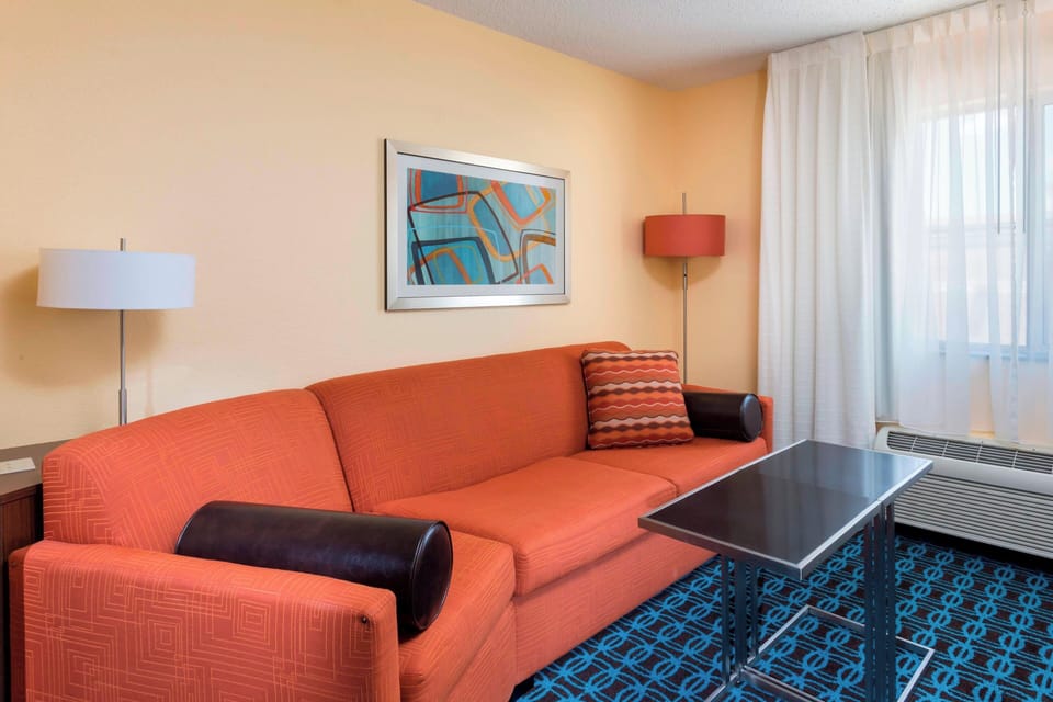 Executive Suite, 1 King Bed with Sofa bed | Living area | Flat-screen TV