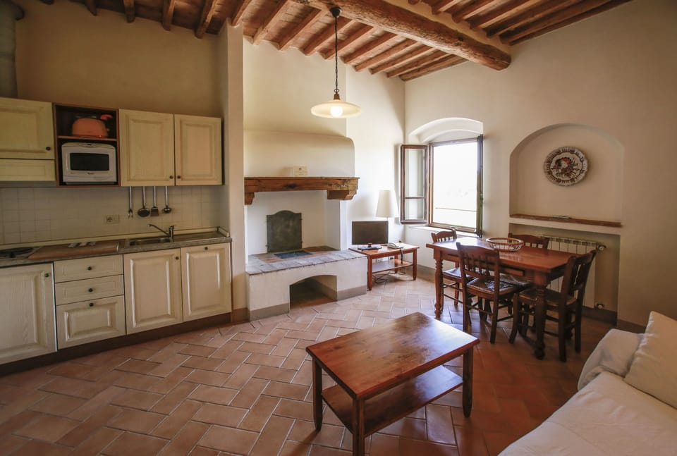 Apartment, 1 Bedroom | Living room | Flat-screen TV