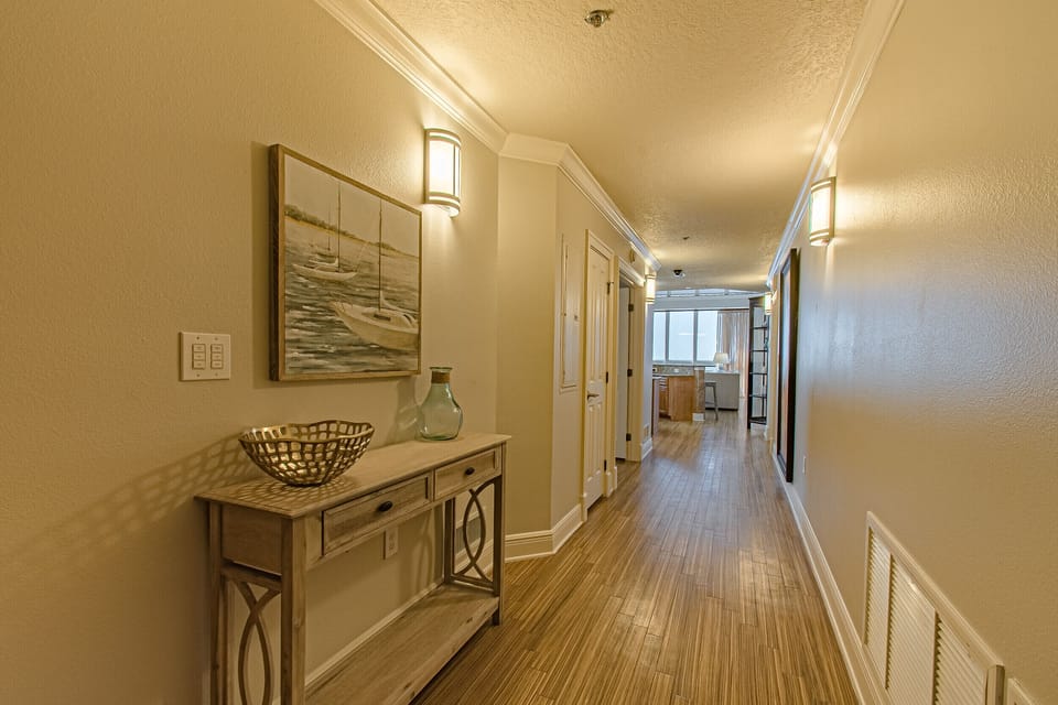 Hallway to master bedroom and kitchen 