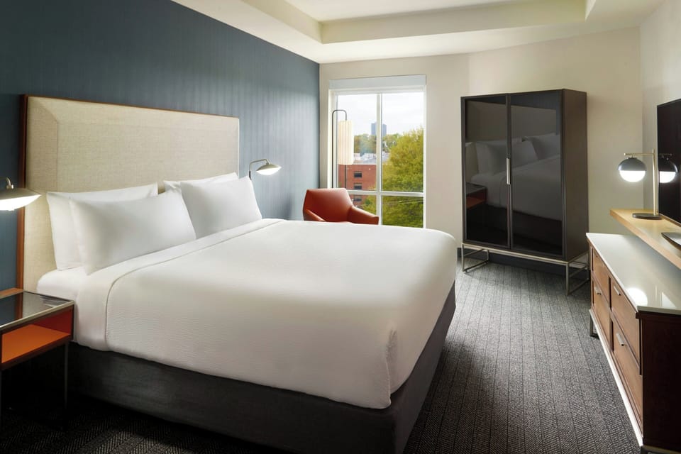 Premium bedding, memory foam beds, individually furnished, desk