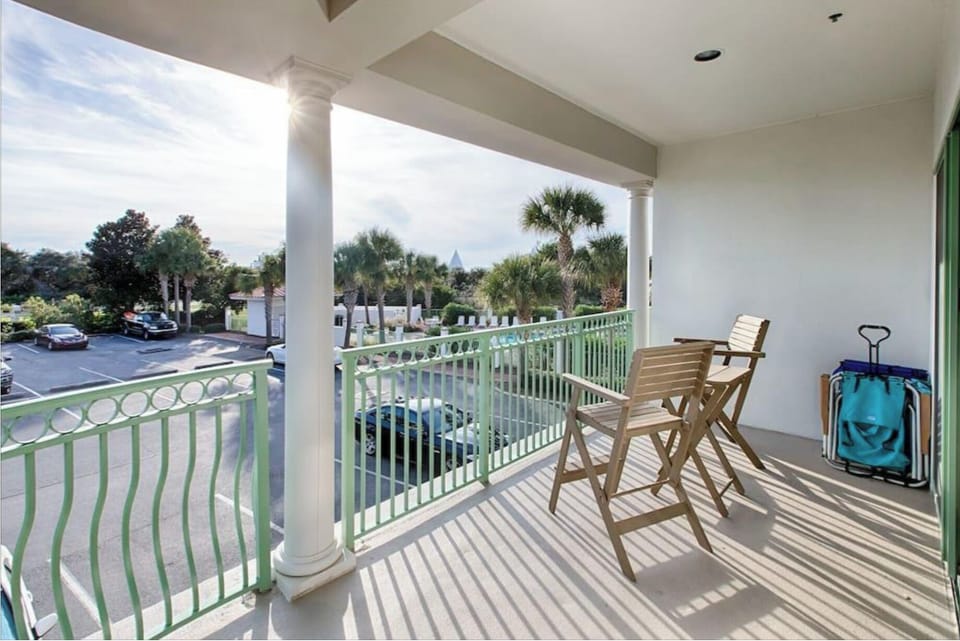 Unwind on your private balcony with tropical views, perfect for morning coffee or evening relaxation in the Florida breeze.